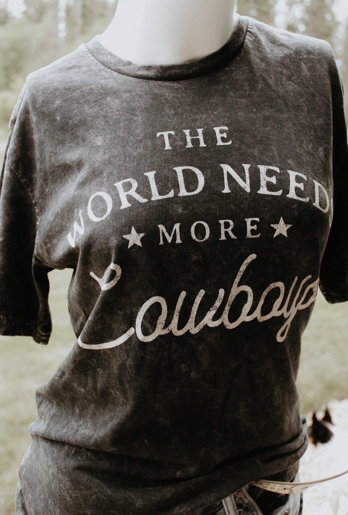 The World Needs More Cowboys Black Tee